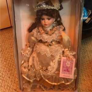 Elegant Porcelain Doll with Lace Dress